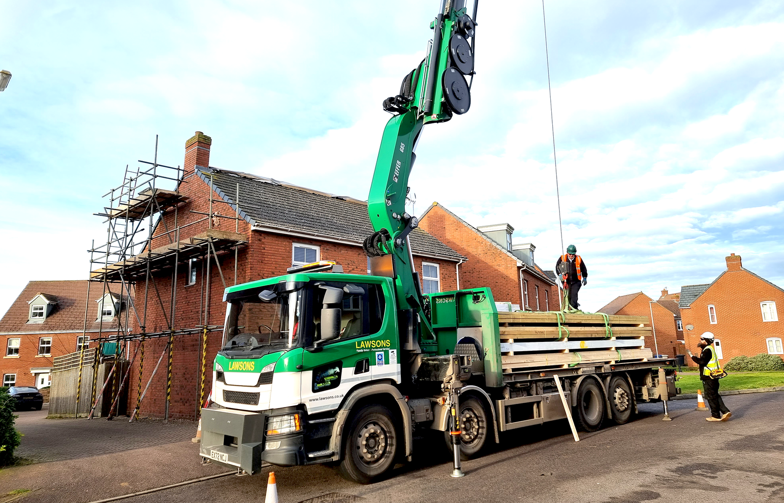 Structural steelwork being lifted into place for a loft conversion in Desborough