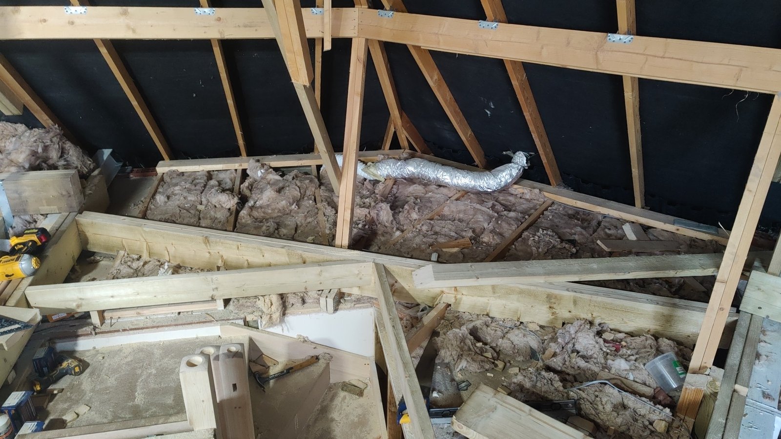Existing loft roof structure before conversion work